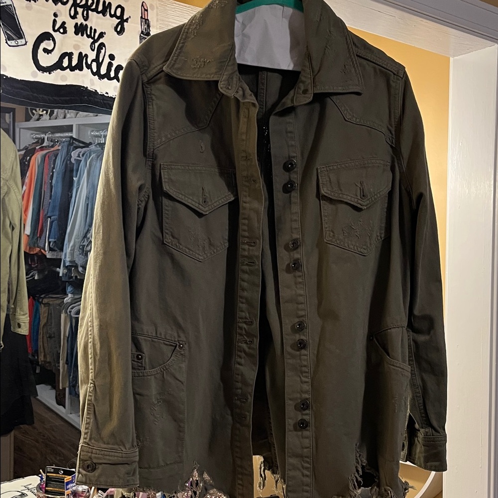 Free People EUC Olive distress Jean Jacket size small very oversized.